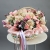 Композиция в корзине "Диодора" из французских роз Квиксенд, диантусов и кустовых пионовидных роз Бомбастик в Коломне